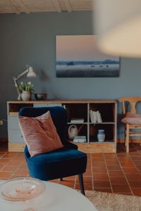 Wohnzimmer Anrichte mit Sessel